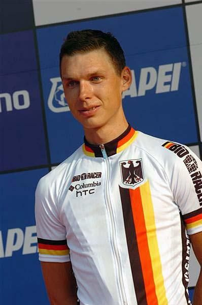 Tony Martin (Germany) waits for his medal
