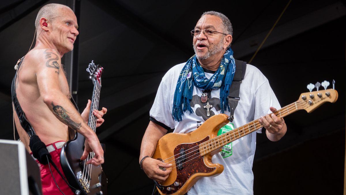 Flea and Geroge Porter Jr. George Porter of the Meters sits in with the Red Hot Chili Peppers during their performance at the New Orleans Jazz &amp; Heritage Festival 2016 at Fair Grounds Race Course on April 24, 2016 in New Orleans, Louisiana.