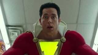 A still of Zachary Levi starring in DCEU movie Shazam! wearing a red and yellow outfit.
