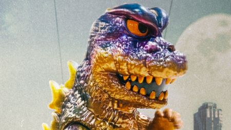 A close-up view of the Mondo Godzilla UFO Attack Peter Variant against a grainy background