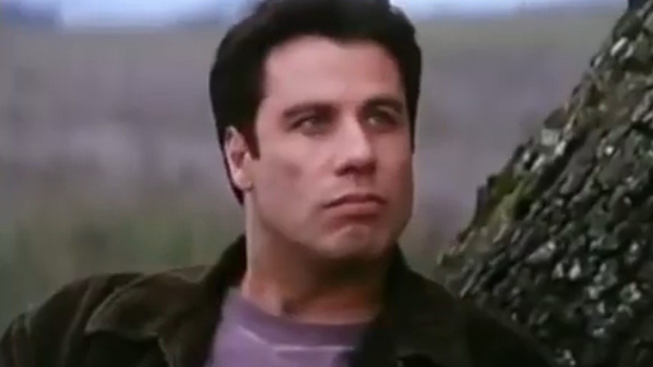 John Travolta beside a tree in Phenomenon