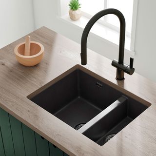 clean a granite sink and black tap