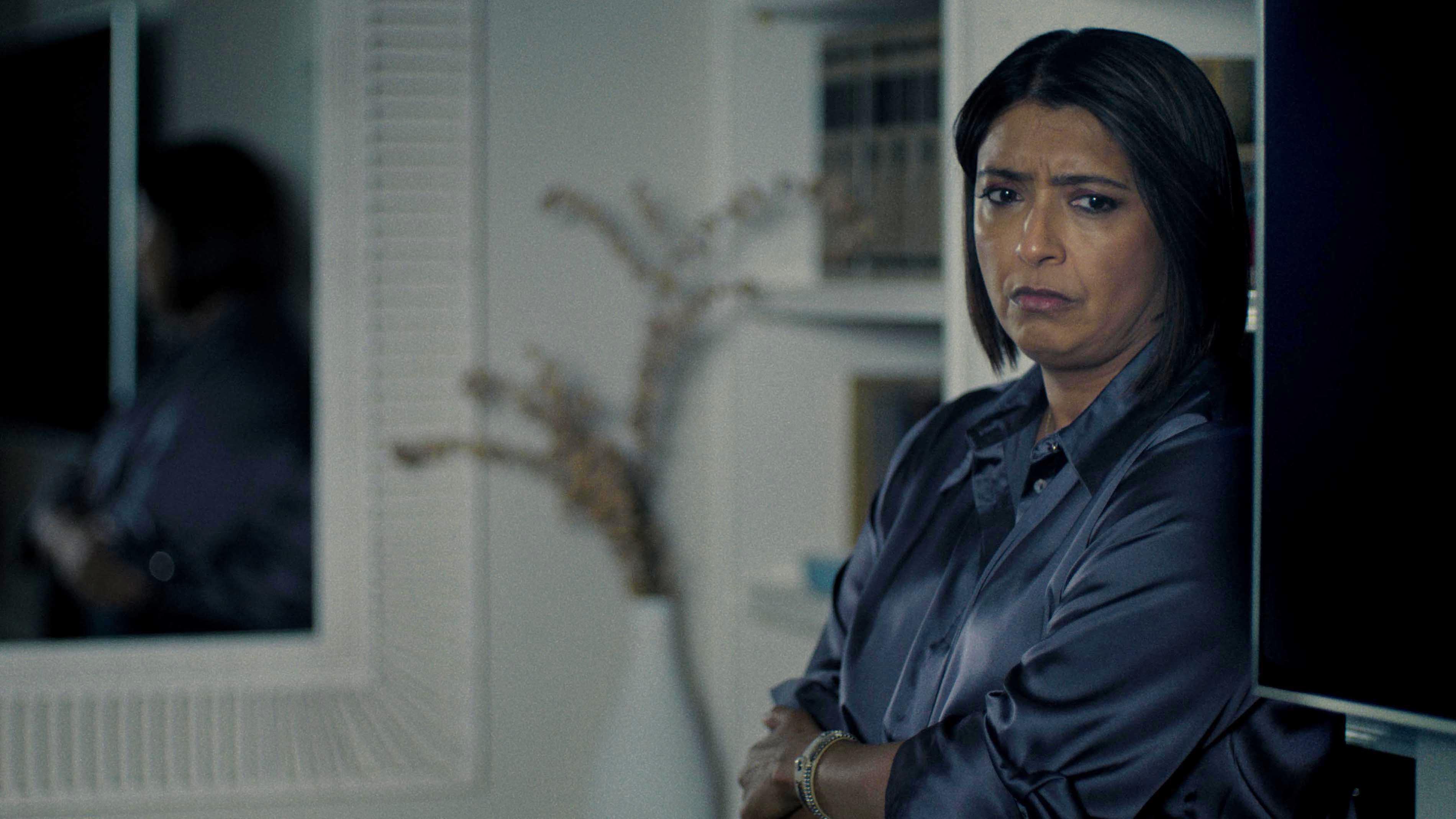 Sunetra Sarker as Alice Miller looking worried in The Game.