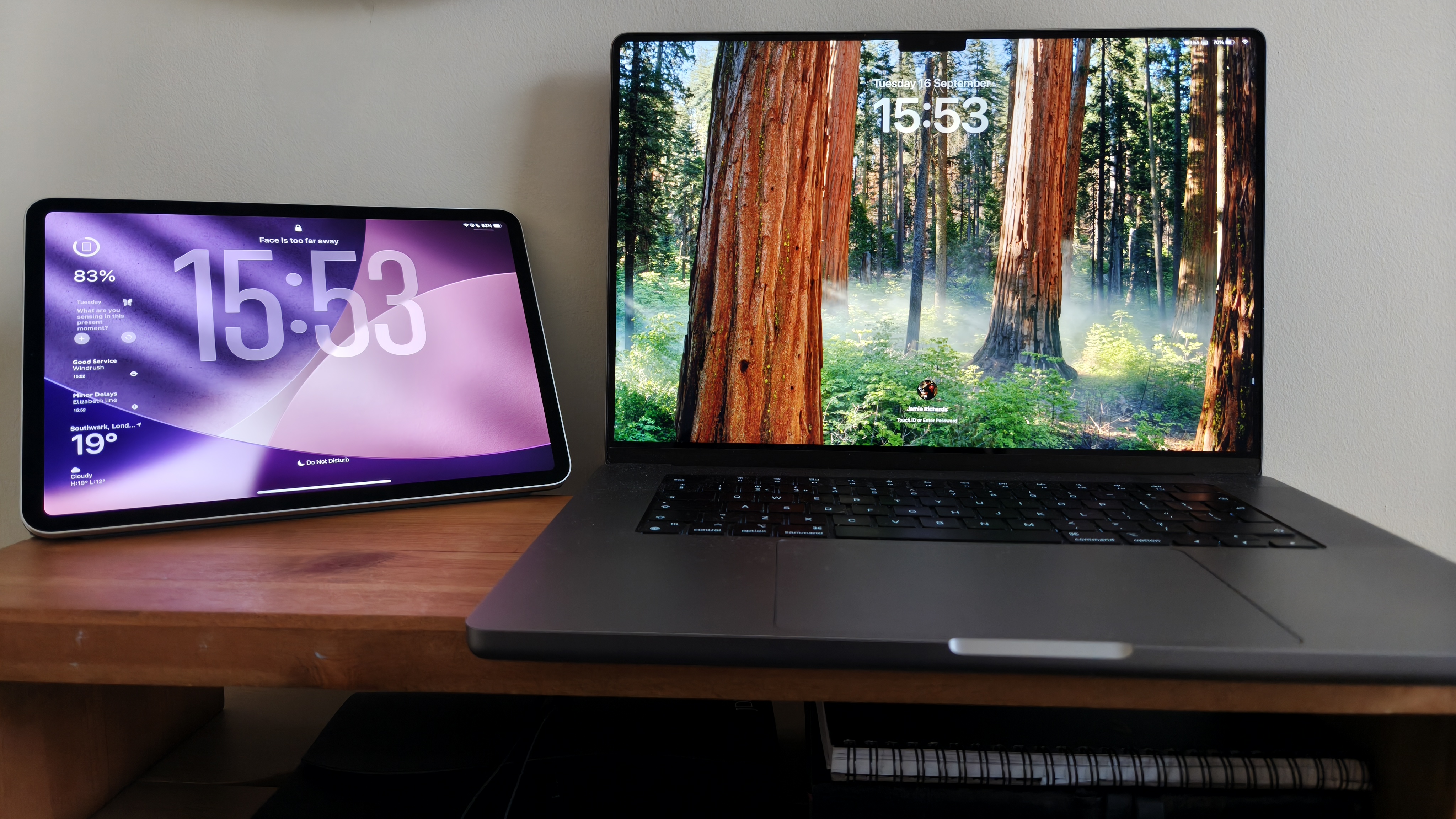 iPad Pro and Macbook Pro on a desk riser side by side