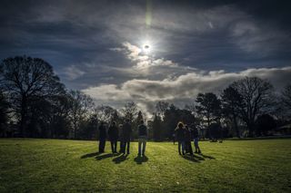 Solar eclipse and viewers