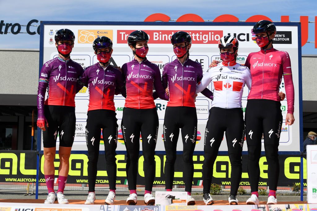 CITTIGLIO ITALY MARCH 21 Start Podium Chantal Van Den Broek Blaak of Netherlands KarolAnn Canuel of Canada Elena Cecchini of Italy Niamh FisherBlack of New Zealand Ashleigh Moolman Pasio of South Africa Anna Shackley of The United Kingdom and Team SD Worx during the 45th Trofeo Alfredo BindaComune di Cittiglio 2021 Womens Elite a 1418km stage from Cocquio Trevisago to Cittiglio 257m Mask Covid safety measures Team Presentation TrBinda UCIWWT on March 21 2021 in Cittiglio Italy Photo by Tim de WaeleGetty Images