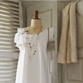 mannequin with white dress