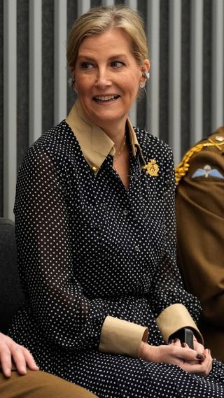 Duchess Sophie listens to a performance by the Band of the Coldstream Guards during a visit to Royal Military Academy Sandhurst