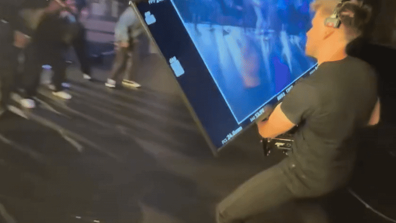 GIF of Reel from @bbthedp, depicting Cinematographer Brian Beckwith using a 55-inch on-camera monitor to film people dancing 