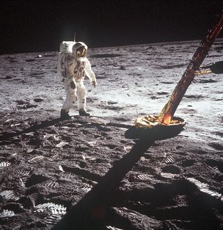 Buzz Aldrin walks on the surface of the moon near a leg of the lunar module in this photo snapped by fellow Apollo 11 astronaut Neil Armstrong.