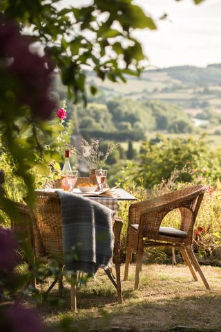 outdoor dining at renovated rustic cottage in Wye Valley