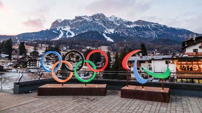The Olympic and Paralympic logos are seen ahead of the 2026 Winter Games in Cortina, Italy