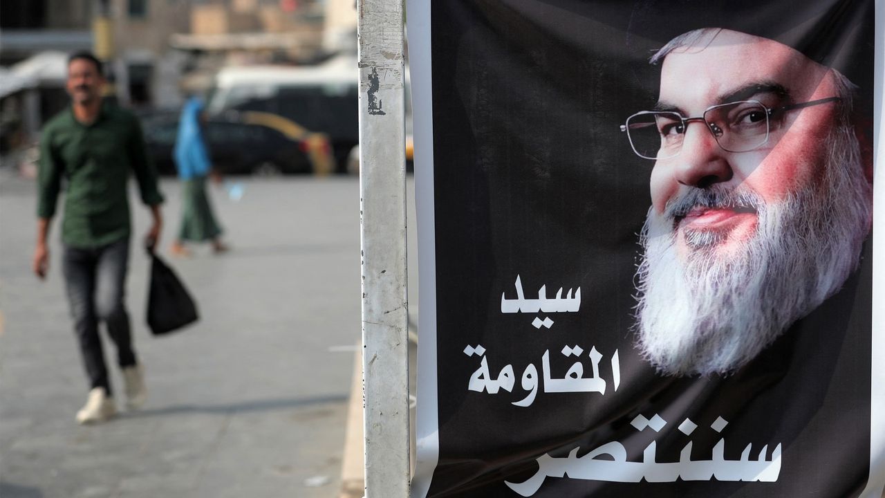 A banner depicting Hassan Nasrallah