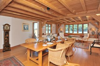 boathouse with wooden table wooden beams and flooring