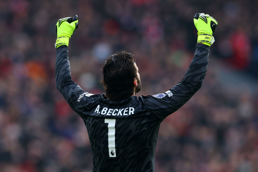 Alisson of Liverpool celebrates his side's second goal during the Premier League match between Liverpool FC and Wolverhampton Wanderers FC at Anfield on February 16, 2025 in Liverpool, England.