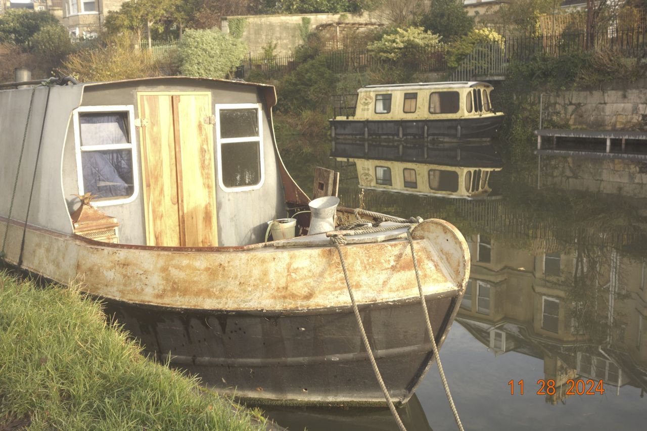 Canal in the city of Bath, UK, with retro photo picture effect