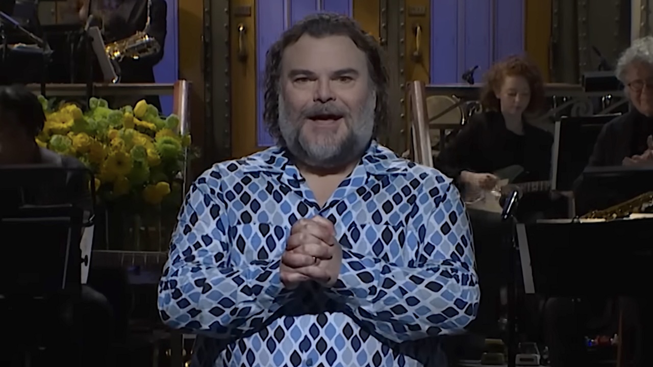 Jack Black hosting SNL in blue patterned shirt in 2025