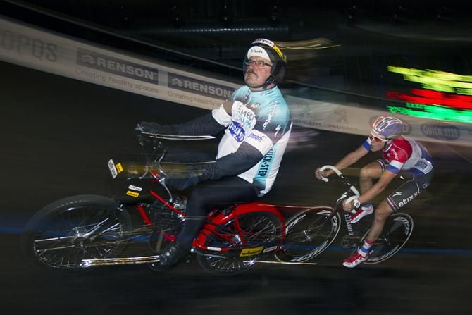 Dutch road champion Niki Terpstra glued to the wheel of a derny