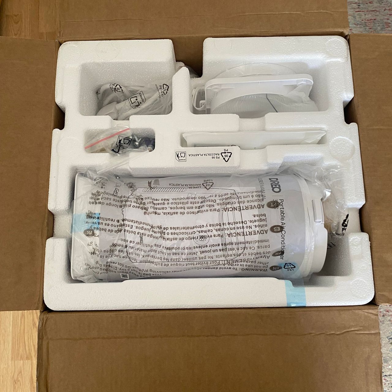 Accessories packaged in the box of the Dreo 318s portable air conditioner