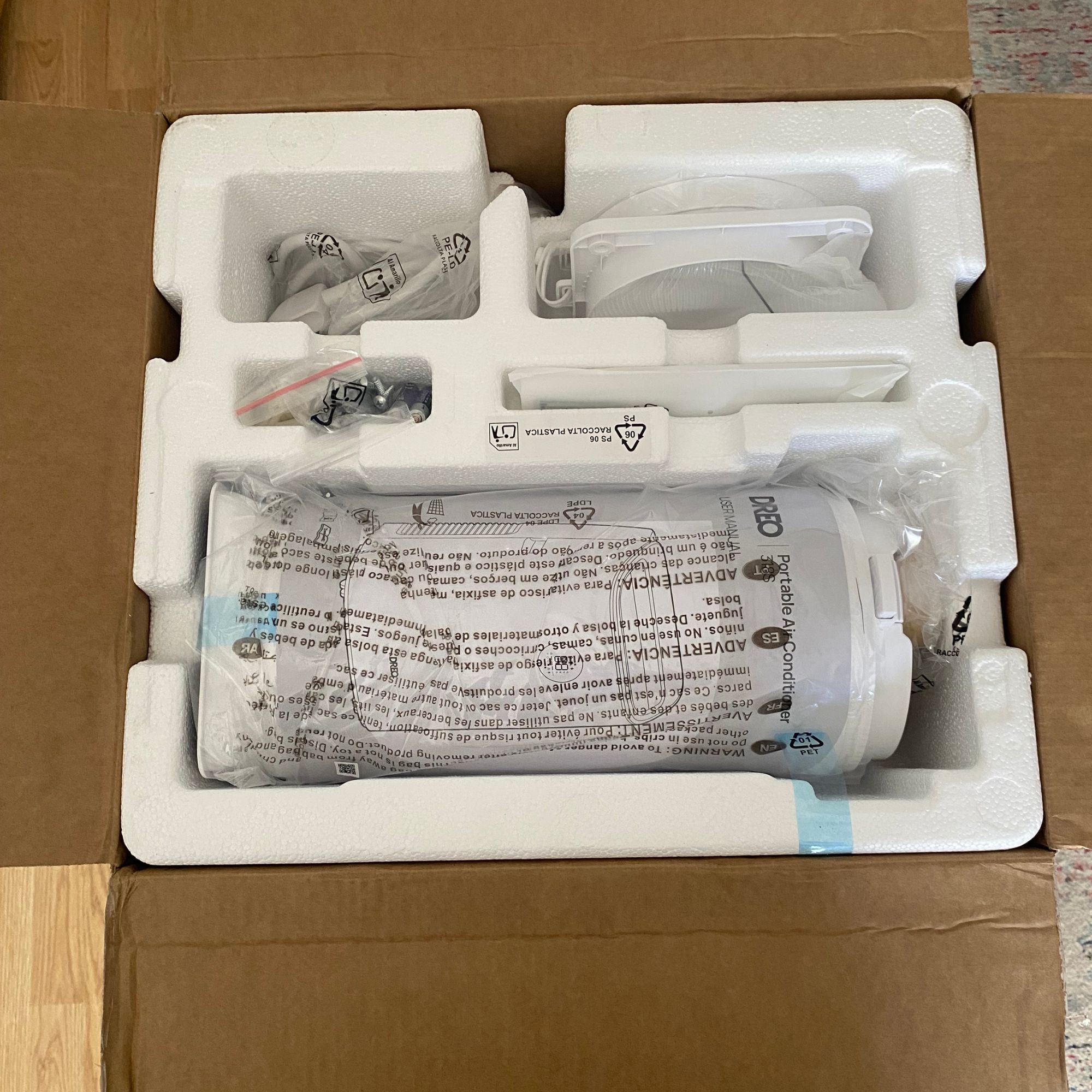 Accessories packaged in the box of the Dreo 318s portable air conditioner