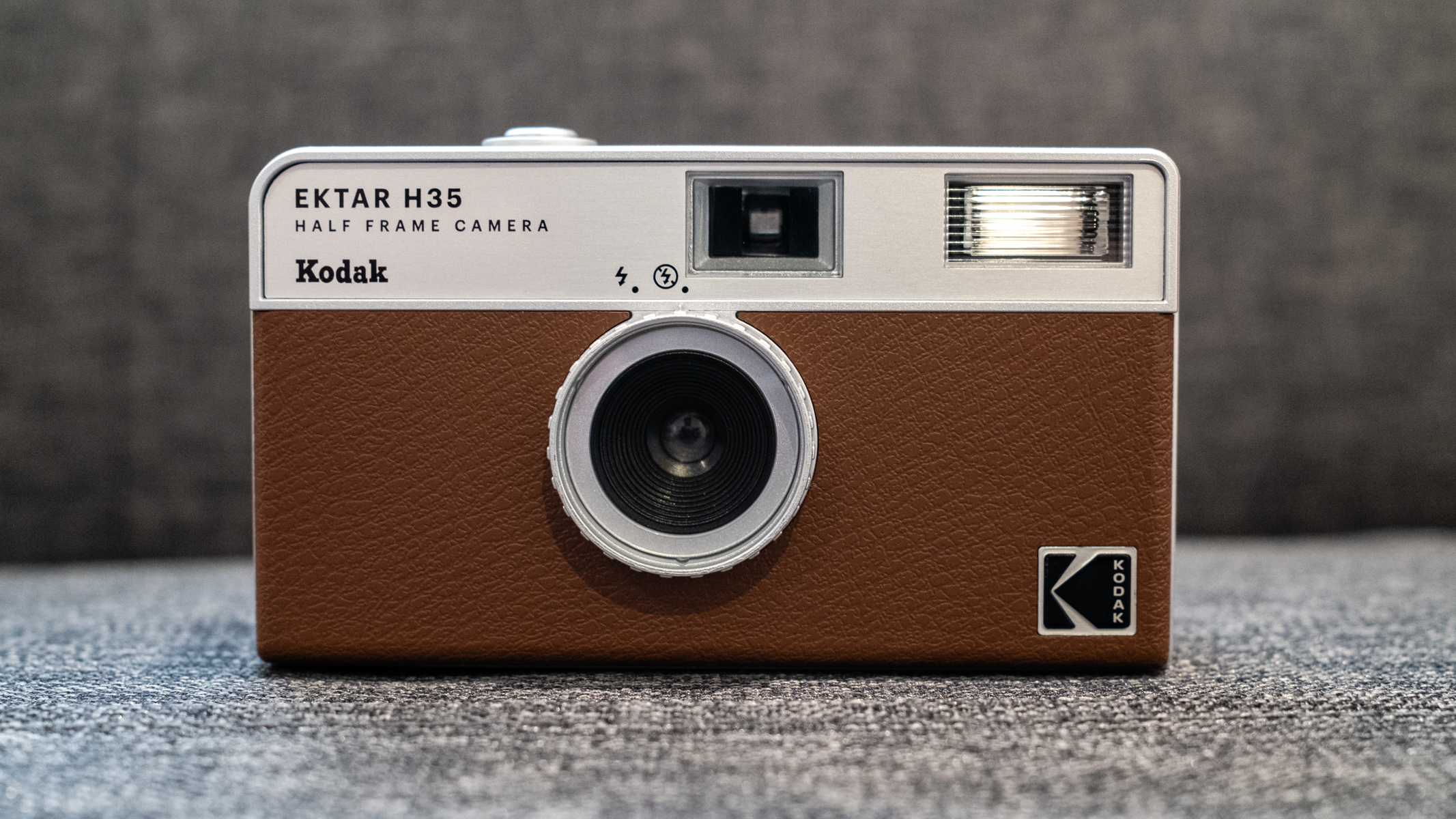 Kodak Ektar H35 front of camera on a gray sofa