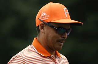 Rickie Fowler of the United States walks from the fourth tee during the final round of the Rocket Mortgage Classic at Detroit Golf Club