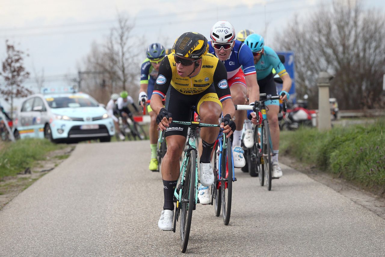 Dylan Groenewegen and Arnaud Demare chase after the level crossing