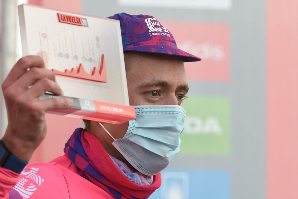 EF Pro Cyclings British rider Hugh Carthy celebrates on the podium after winning the 12th stage of the 2020 La Vuelta cycling tour of Spain a 1094km race from Pola de Laviana to Alto de lAngliru on November 1 2020 Photo by MIGUEL RIOPA AFP Photo by MIGUEL RIOPAAFP via Getty Images