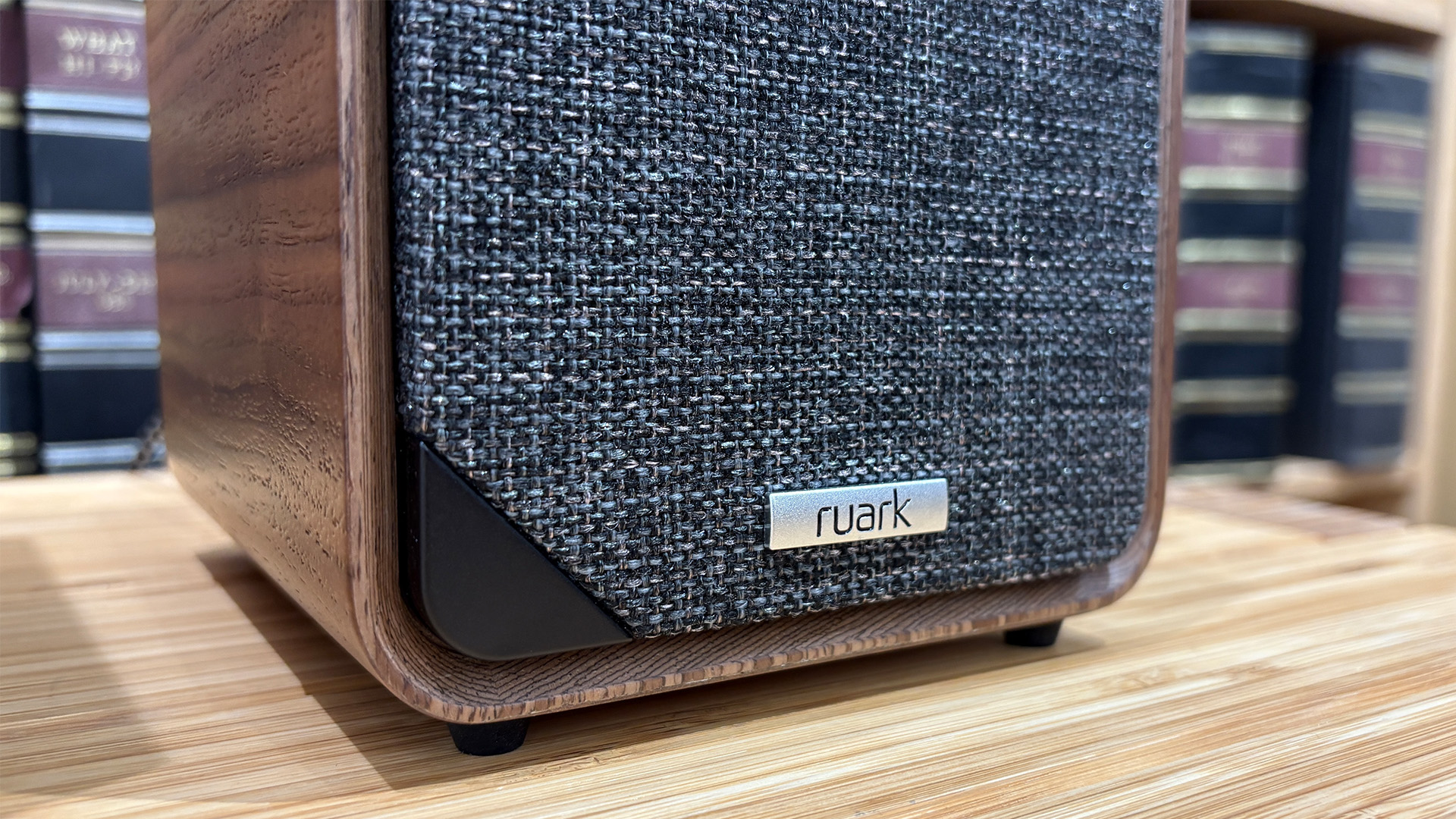 Ruark MR1 Mk3 active speakers detail of bottom of one speaker and Ruark logo