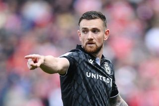 Jack Marriott of Wrexham gestures during the Sky Bet League One match between Bolton Wanderers FC and Wrexham AFC at University of Bolton Stadium on August 18, 2024 in Bolton, England.