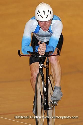 After 58 min . the strain of an hour record attempt can be seen in Dr. Kay's face