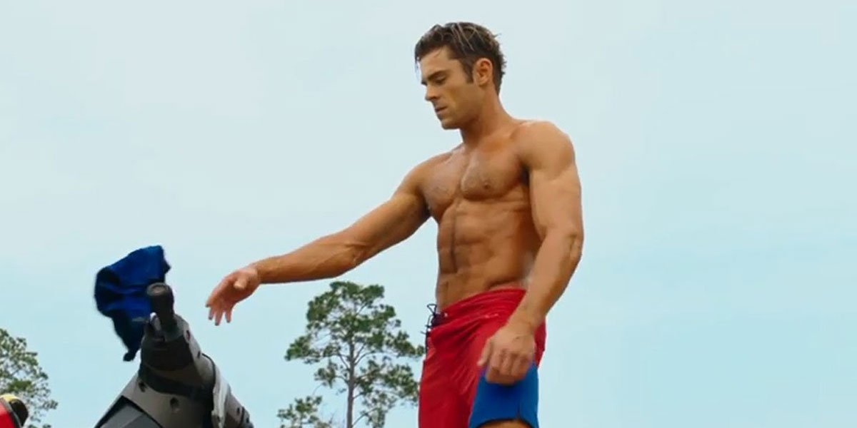 Zac Efron Shows-Off His Rock-Hard Body, Nuzzles Co-Star at 'Baywatch' Shoot