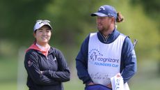 Rose Zhang and her caddie Olly Brett share a smile at the 2024 Cognizant Founders Cuo