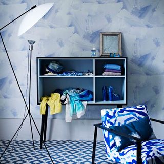 blue organised dressing area with open fronted sideboard