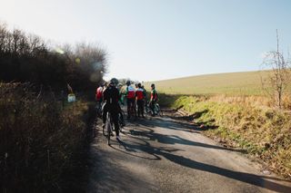 A group of riders on a bike ride in the countryside