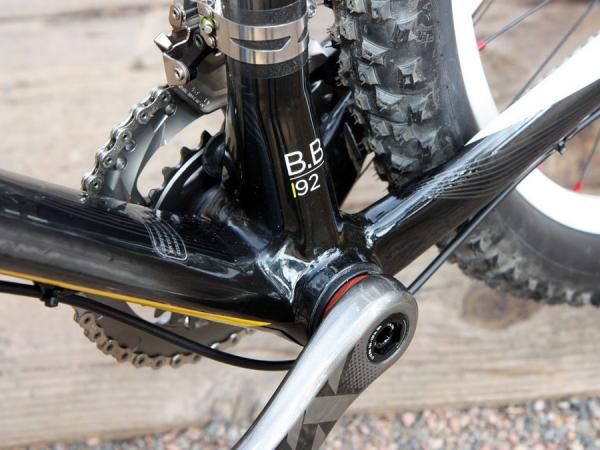 Press-fit bearing cups allow for a wider bottom bracket shell and more real estate for the down tube, seat tube, and chain stays.