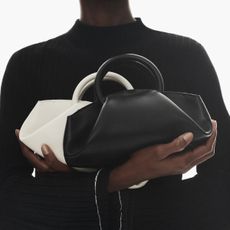COS black and white top-handle bags