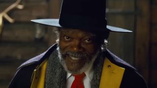Samuel L Jackson wears an antagonistic smile as he sits telling a story in The Hateful Eight.