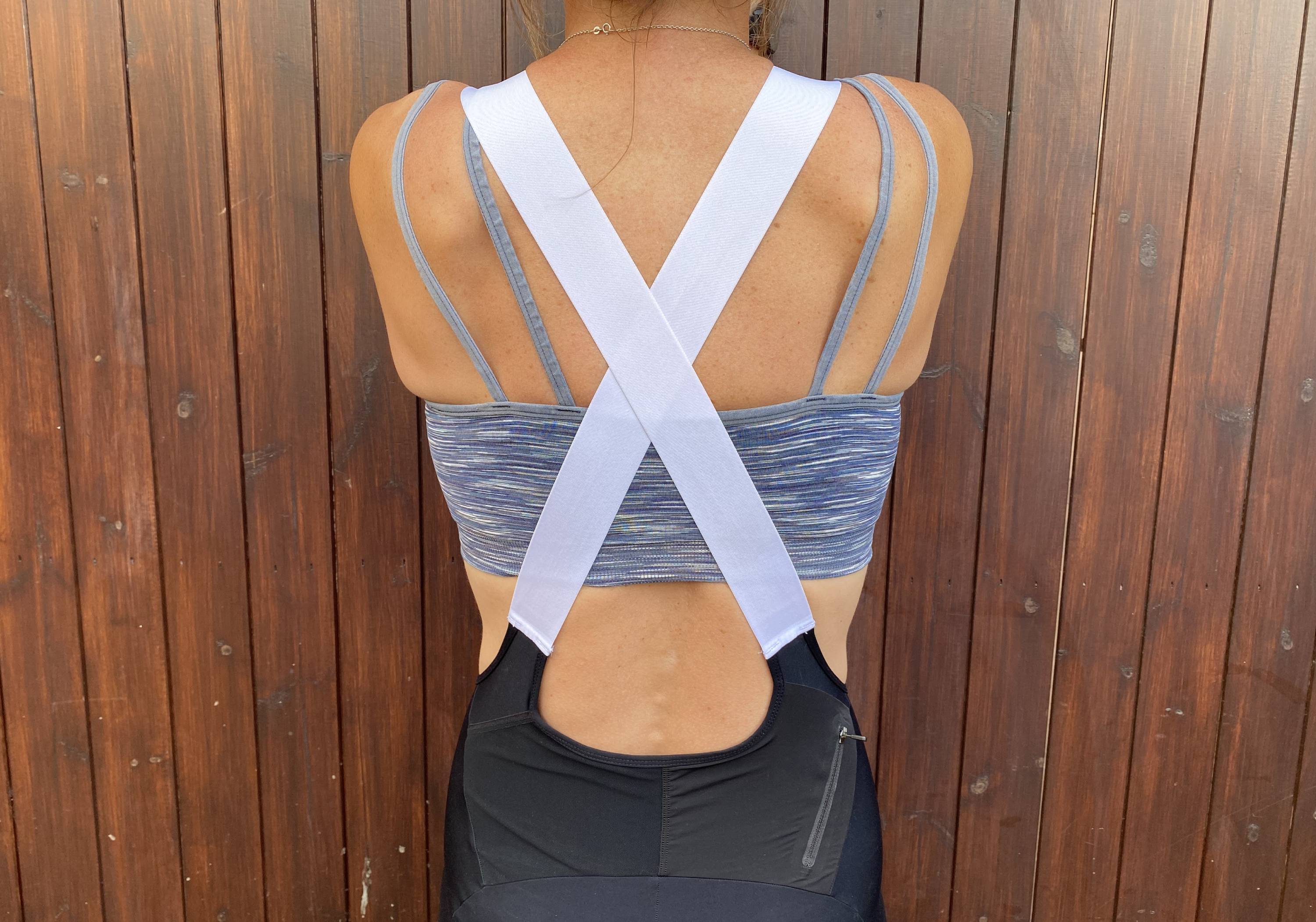 Easy-pee system uses cross-over bib straps