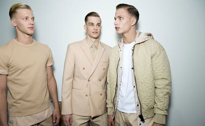Males modelling beige outfits