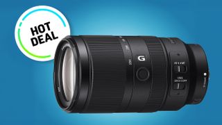 Close-up of a camera lens (Sony E 70-350mm f/4.5-6.3 G OSS) with controls, set against a gradient blue background, featuring a "Hot Deal" badge