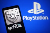 UKRAINE - 2022/02/02: In this photo illustration, a Bungie Inc. logo of a video game developer is seen on a smartphone screen and PlayStation (PS) logo in the background. (Photo Illustration by Pavlo Gonchar/SOPA Images/LightRocket via Getty Images)