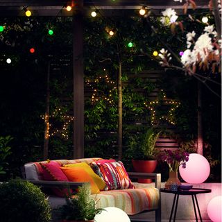 outdoor with tree lighting and sofa