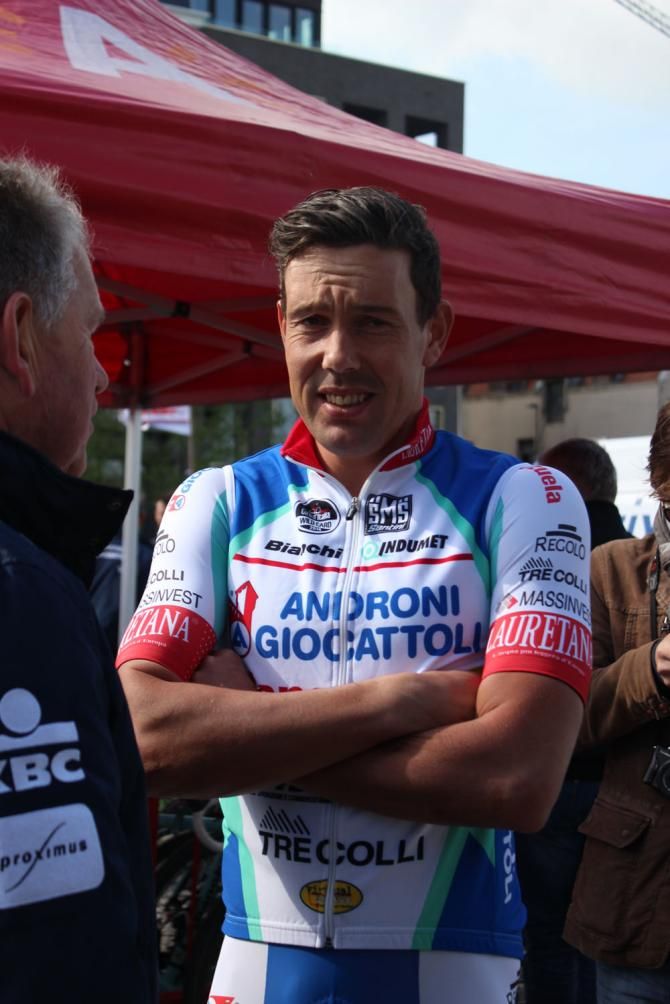 Kenny van Hummel (Androni Giocattoli) gets cold as he waits to sign on