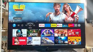 Panasonic Z95A OLED TV on stand in living room