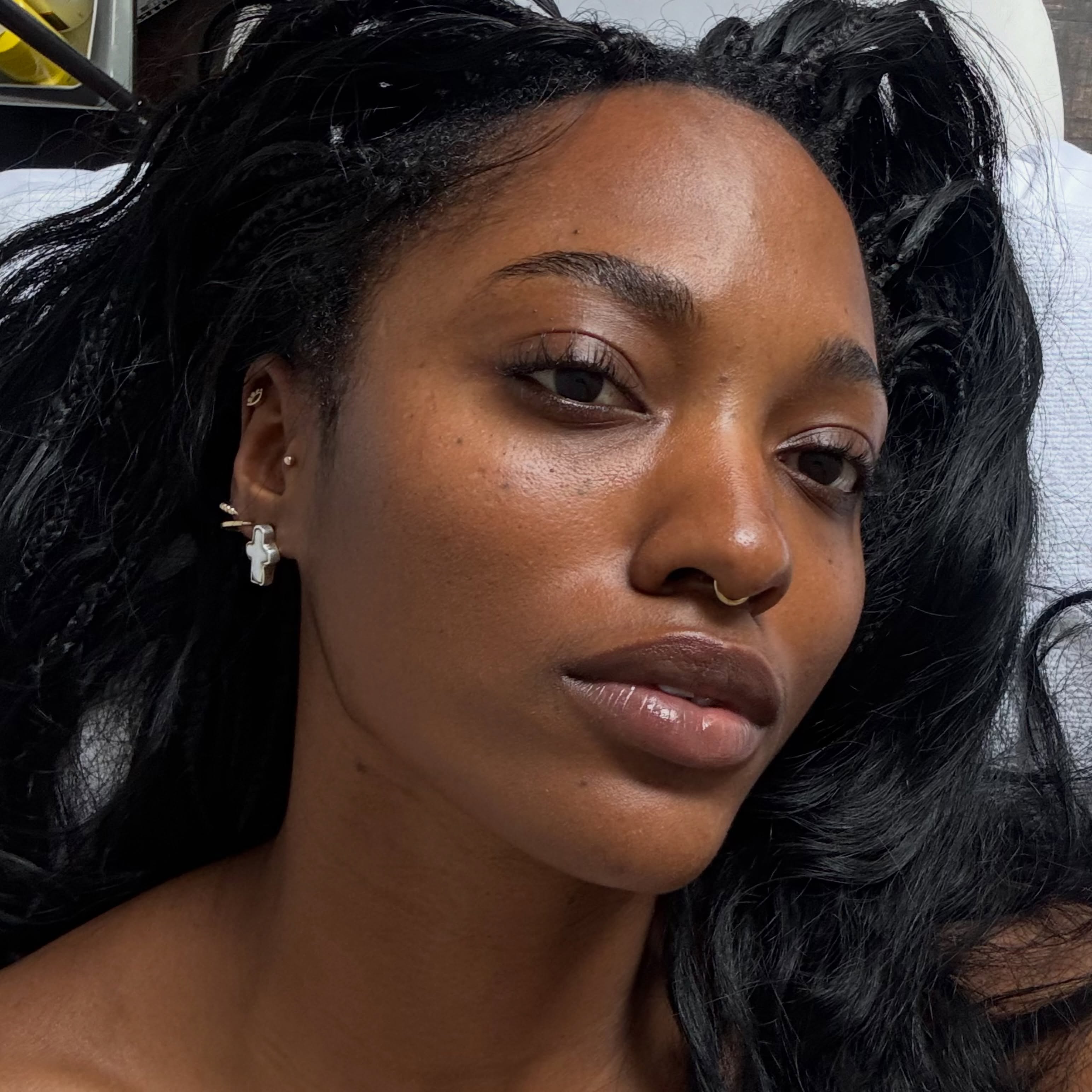 A woman with glowing skin.
