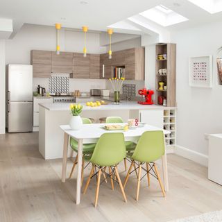 united two spaces by joining the kitchen and living room by a counter