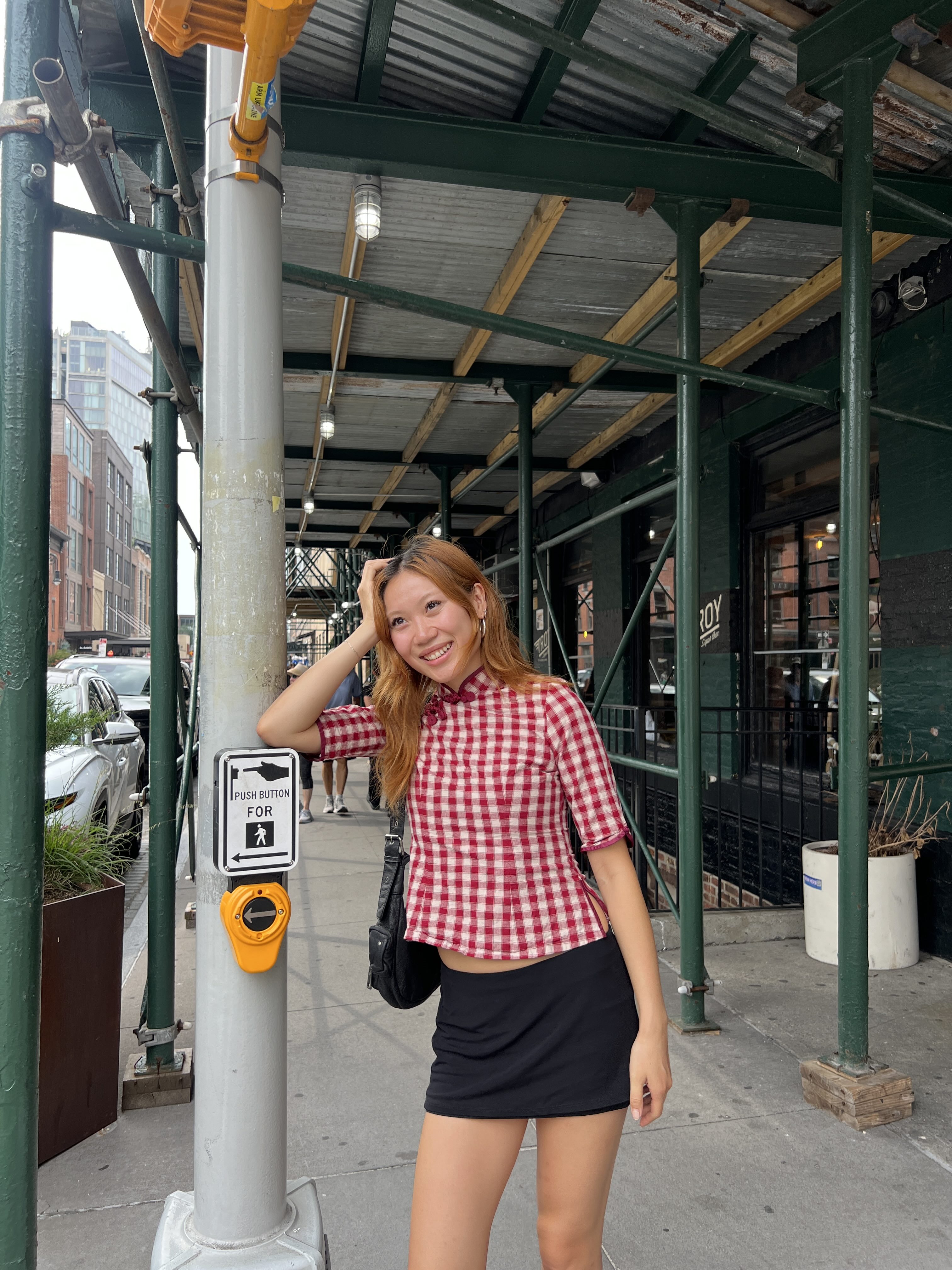 Vivian Li wearing frog closures as part of her outfit