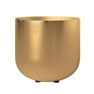 A curved brushed gold planter