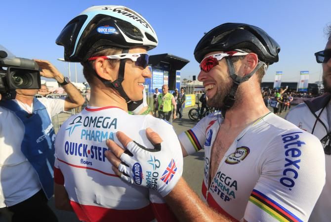 Stage 6 winner Mark Cavendish thanks teammate Michal Kwiatkowski for his assistance in the lead-out
